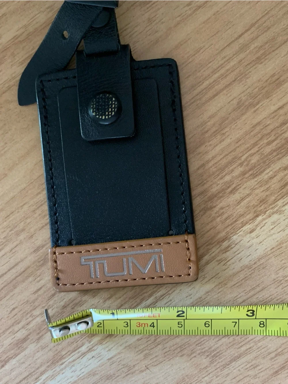 Tumi luggage tag